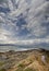 Panoramic view of the Stunning storm clouds, waves and the rocky beach in the Aegean sea on a summer day on the island of Evia, Gr