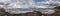 Panoramic view of the Stunning storm clouds, waves and the rocky beach in the Aegean sea on a summer day on the island of Evia, Gr