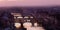 Panoramic view with sunbeam at medieval stone bridge Ponte Vecchio and the Arno River from the Ponte Santa Trinita Holy Trinity