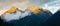 Panoramic view of the sunrise on the lofty mountains surrounding Aru Valley in Pahalgam, Kashmir, India