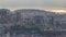 Panoramic view during sunrise over Lisbon and Almada from a viewpoint in Monsanto morning timelapse.