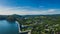 Panoramic view during sunset, on Lake Solina overlooking the modern gondola lift with a lookout tower over the Solina water dam