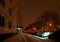 Panoramic view of a swept street, sidewalks and cars near an apartment building on Frunze street in the early morning