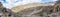 Panoramic view taken from the Barranco Wall overlooking the Baranco camp and its surrounding valley on the Machame hiking route