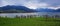 Panoramic view at the tegernsee lake and the blue and snow cover