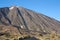 Panoramic view of the Teide peak next to a road