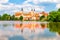 Panoramic view of Telc Castle. Water reflection, Czech Republic. UNESCO World Heritage Site.