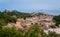 Panoramic View to the Cape Coast Downtown Houses among Green Trees in Ghana