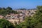 Panoramic View to the Cape Coast Downtown Houses among Green Trees in Ghana