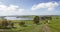 Panoramic view to lake riegsee on a sunny day