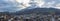 Panoramic view to maount pilatus massif sneaking clounds over lopper