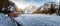 Panoramic view to the mountainscape and frozen lake Lago Di Braies, Dolomites, Italy