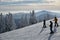 Panoramic view to the ski slopes with skiers from the Octagon cafe observation deck