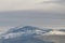 Panoramic view of the top of Monte Serra covered by snow, province of Pisa, Italy
