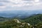 Panoramic view from the top of mountain to many mountain peaks around