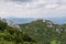 Panoramic view from the top of mountain to many mountain peaks around