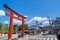 Panoramic view of Torii gate in front of shinto shrine and japanese old building