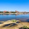 Panoramic view of Torun city and Wisla Vistula river in sunny day. Poland, summer 2019