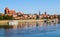 Panoramic view of Torun city and Wisla Vistula river in sunny day. Poland, summer 2019