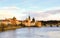 Panoramic view of the tower with a clock on the river vatslav mala strana part of the stone bridge. Prague Czech Republic March