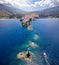 Panoramic view of the town of Andros island, Cyclades, Greece, with the famous Lighthouse