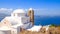 Panoramic view of traditional greek cycladic church and sea