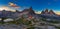 Panoramic view of  Tre Cime and  rifugio hut before sunrise in summer, Tre Cime di Lavaredo National Park, Dolomites, Italy