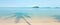 Panoramic view of tropical sea in summer, beautiful shadow of coconut palm tree on blue sea, yacht, green islands and light blue