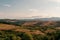 Panoramic view of the Tuscan countryside with the characteristic colors of its hills