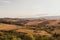 Panoramic view of the Tuscan countryside with the characteristic colors of its hills