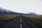 Panoramic view of typical empty icelandic asphalt highway street Ring Road Golden Circle in snow winter Iceland