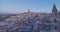 Panoramic view of typical stones Sassi di Matera and church of Matera under blue night sky, time lapse effect, movement