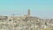 Panoramic view of typical stones Sassi di Matera and church of Matera under blue sky. Basilicata, Italy, zoom out camera