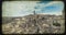 Panoramic view of typical stones Sassi di Matera and church of Matera under blue sky, old vintage retro