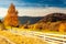 Panoramic view of Ukraine countryside, lonely windy tree, rolling hills and green fields at sunset. Carpathians, Synevyr