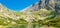 panoramic view of Velicke pleso and Velicky waterfall in High Tatras mountains, Slovakia, Europe