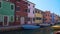 Panoramic view on Venetian canal and doll-like colorful houses, Burano, Venice