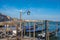 Panoramic view of Venice lagoon with pier and gondolas in Venice.
