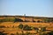 A panoramic view of the village of old town near hebden bridge in west yorkshire with summer sunshine on farms and old mill