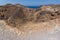 Panoramic view of volcano in Nea Kameni island near Santorini, Greece