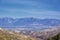 Panoramic view of Wasatch Front Rocky Mountains from the Oquirrh Mountains with fall leaves, by Kennecott Rio Tinto Copper mine, U