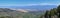 Panoramic view of Wasatch Front Rocky Mountains from the Oquirrh Mountains, by Kennecott Rio Tinto Copper mine, Utah Lake and Grea