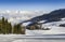Panoramic view of wide and groomed ski piste in resort of Pila in Valle d`Aosta, Italy during winter