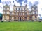 Panoramic view of the Wollaton Hall Museum, standing on a small but prominent hill in Wollaton Park, Nottingham, England.