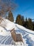 Panoramic view with wood bench in winter in resort Ladis, Fiss, Serfaus in ski resort in Tyrol