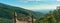 Panoramic view of wooden viewpoint with views of the Ambroz Valley, chestnut forest and mountains in the background