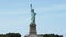 Panoramic view of world famous Statue of Liberty landmark and national monument in New York USA, view from the water.