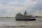 Panoramic view on yacht transporting passengers on Hudson river New York near Statue of Liberty