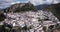 Panoramic view of Zahara de la Sierra white village in Grazalema mountains, Andalusia, Spain