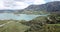 Panoramic view of Zahara lake in front of mountain range in Sierra de Grazalema Natural Park, Spain